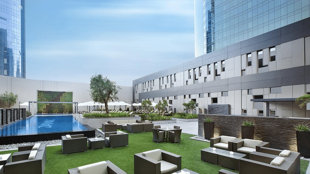 Hotel central photo DAMAC Maison Cour Jardin